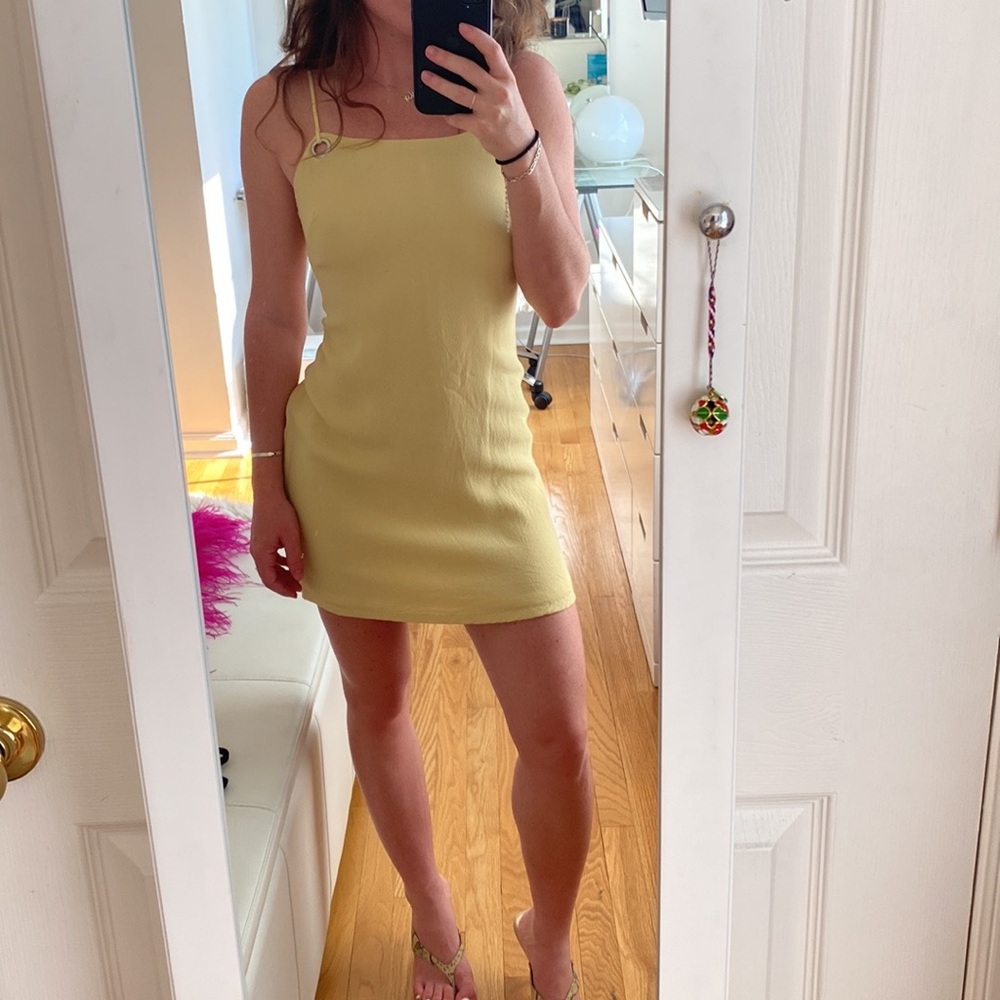 Urban Outfitters pastel yellow open back mini dress